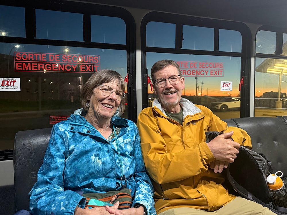 Christine & John on airport shuttle to hotel