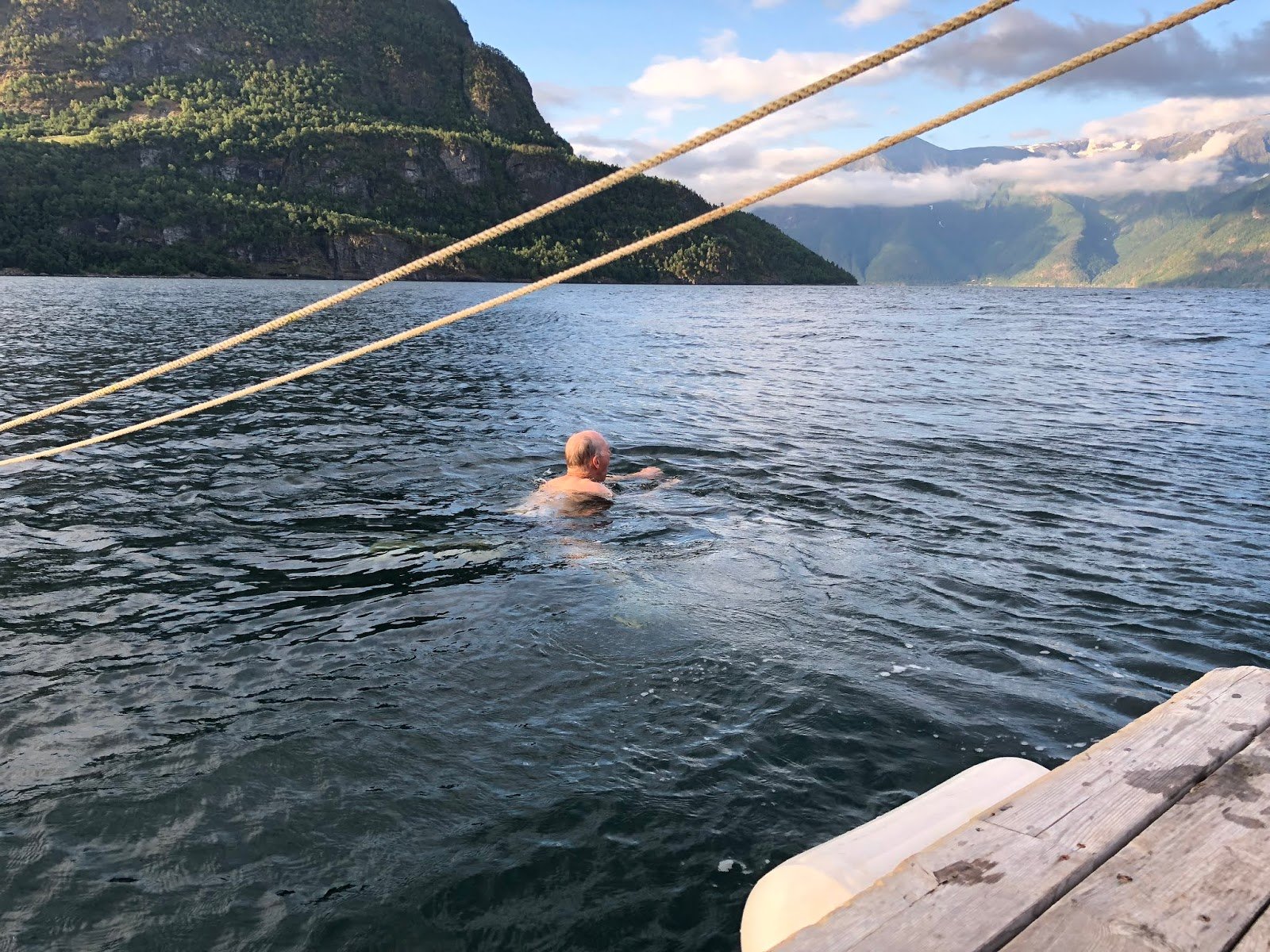 Jim swimming in fjord