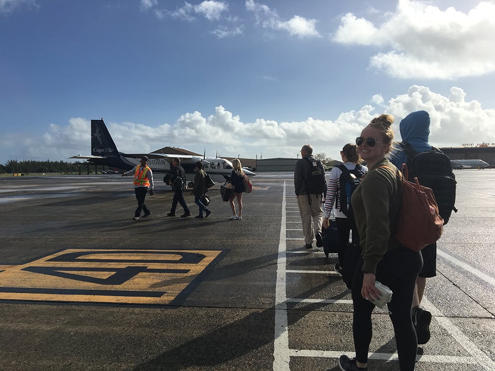 Nicola on tarmac going to small plane