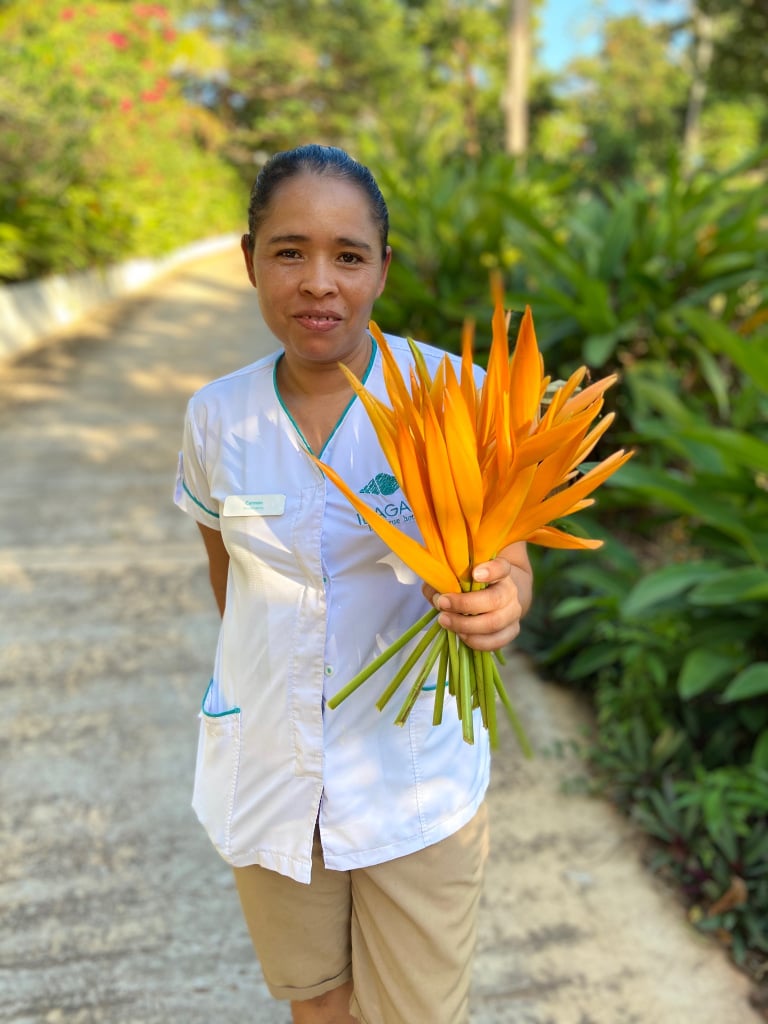 woman with bird of paradise flowers